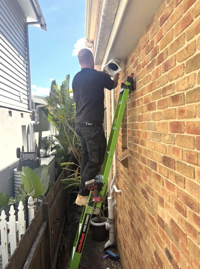 Exterior electrical install on a brick home